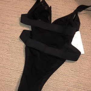 Beginning boutique bodysuit with tags